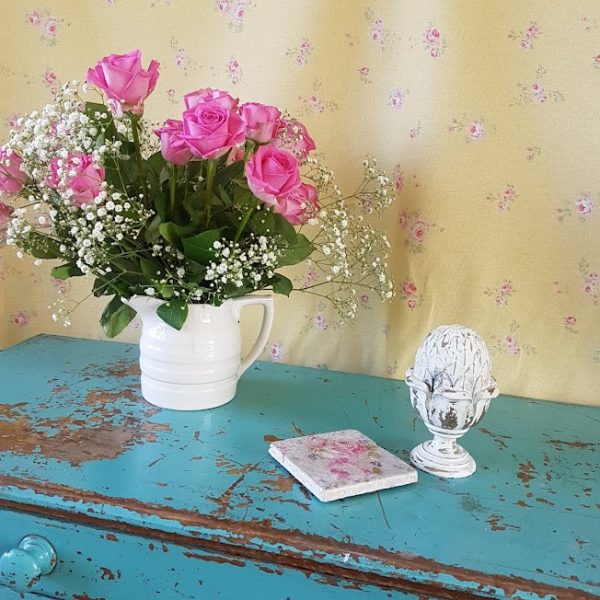 Little pink roses on yellow linen Fabric behind an old blue desk by Rose and Foxgloves