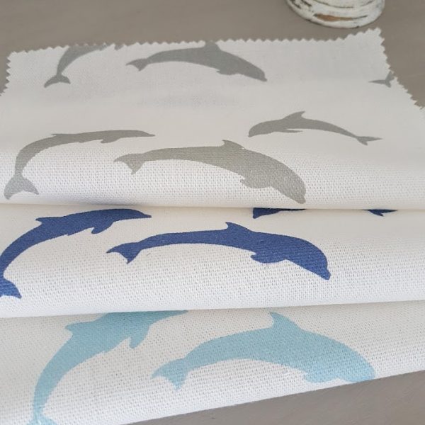Playful Dolphins on Ivory Linen Fabric