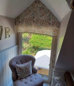 Customers bathroom with Cabbage and Roses Linen Blind